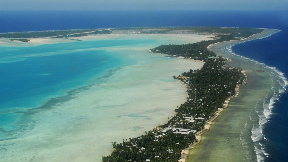 View of South Tarawa, a narrow strip of land between a lagoon and the ocean