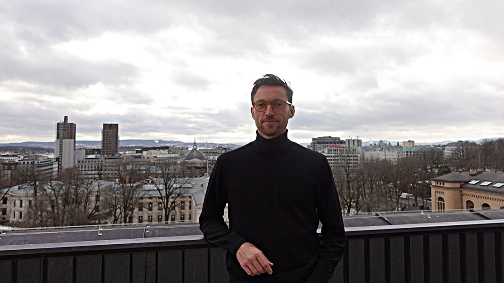 Photo of Konrad Neugebauer on the rooftop of NCHR
