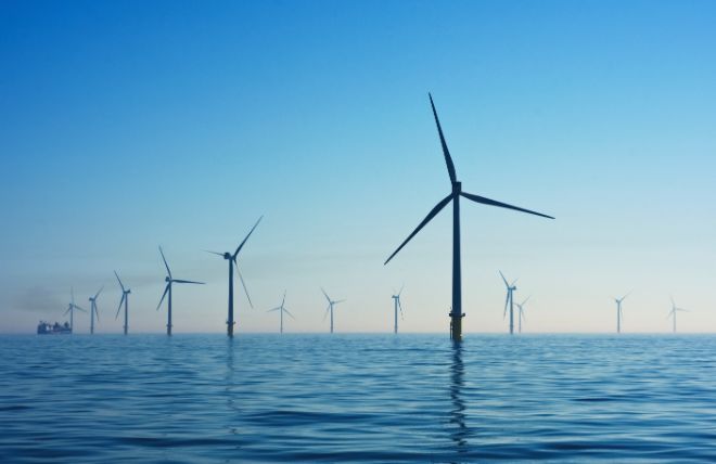 Bildet kan inneholde: vindturbin, vind farm, vindmølle, vind, himmel.