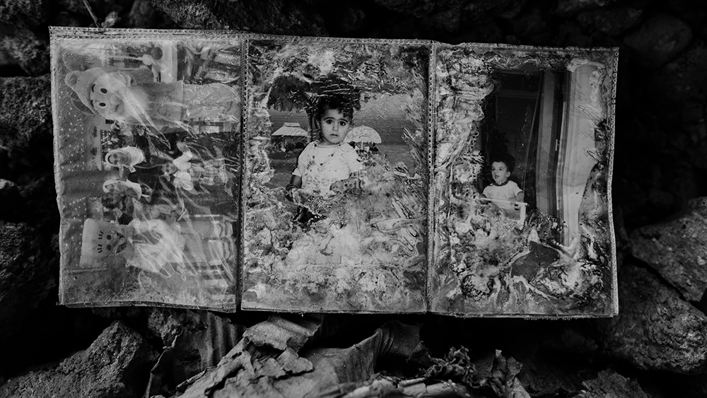 Family photos of children damaged by fire and war