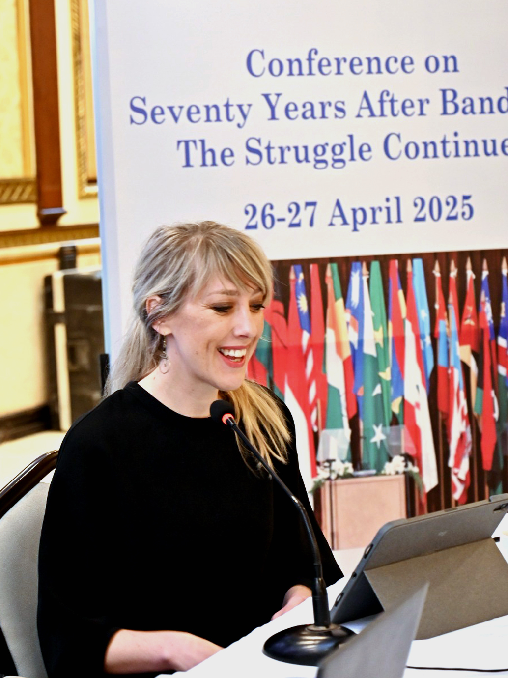 Potrait of Professor Maja Janmyr during her presentation at the conference.