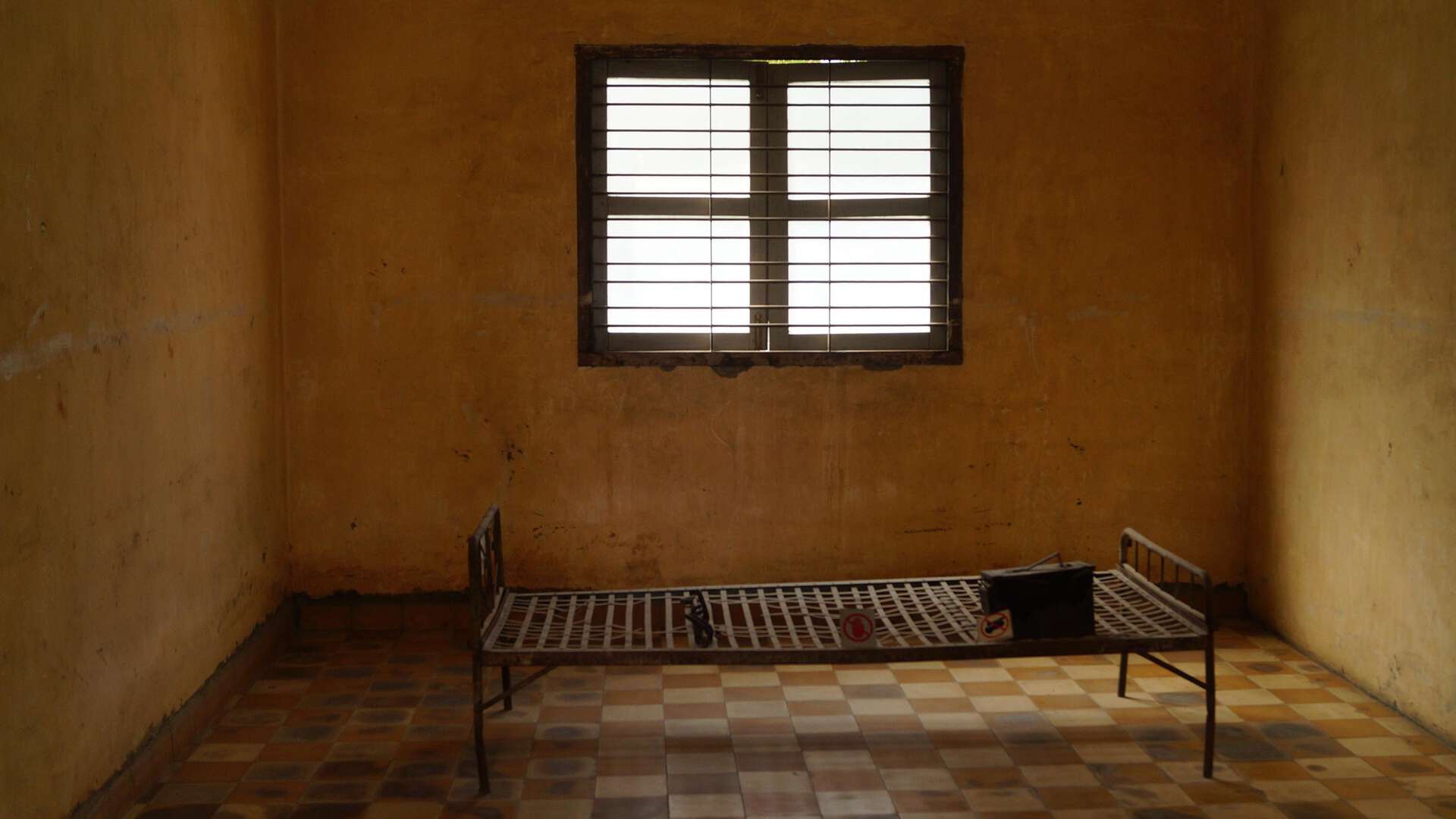Prison cell with bed