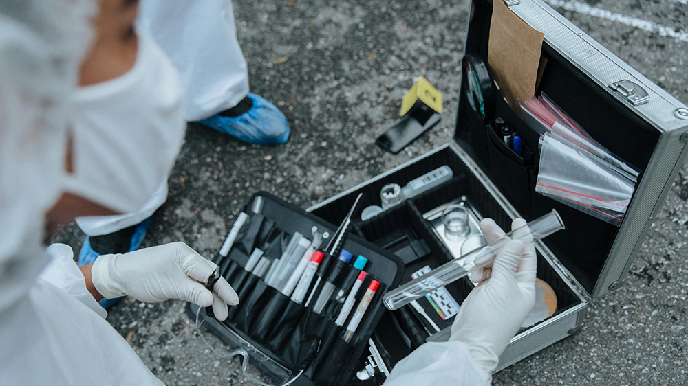 illustrative image of someone collecting evidence 