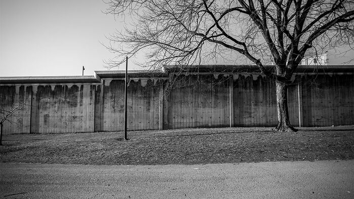 Black and white photo of the walls of Oslo Prison