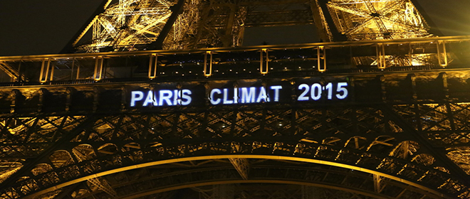 Eiffel Tower in Paris with script "Paris climat 2015"