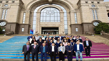 Group photo in front og large university in China