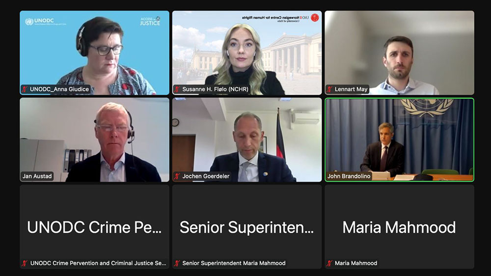 Screenshot of a Zoom conference with nine persons represented