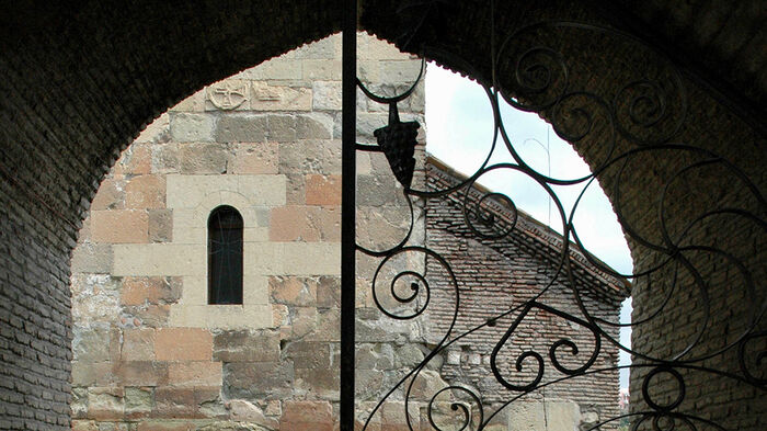 Church viewed through a portal