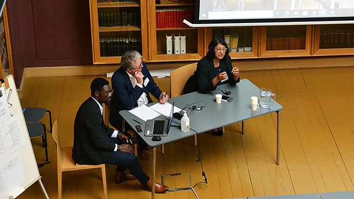Image of panel discussion with Sumudu Atapattu and Bård Anders Andreassen seated at a table